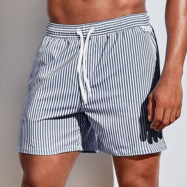 "Randiga snabbtorkande badshorts herr i bomull, blå och ljusgrön, med elastisk midja för sommarens strandäventyr"
