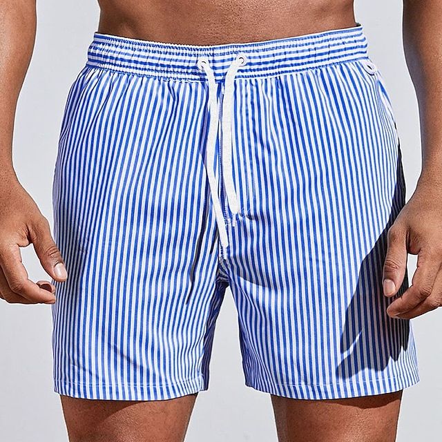 "Randiga snabbtorkande badshorts herr i bomull, blå och ljusgrön, med elastisk midja för sommarens strandäventyr"