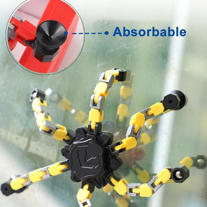 "Röd plast fidget spinner med sugkopp, färgglad och ergonomisk design för barn och vuxna, perfekt för stresslindring."