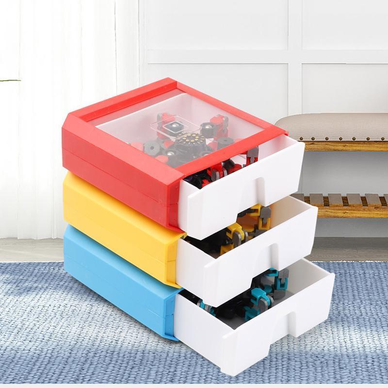 "Röd plast fidget spinner med sugkopp, färgglad och ergonomisk design för barn och vuxna, perfekt för stresslindring."