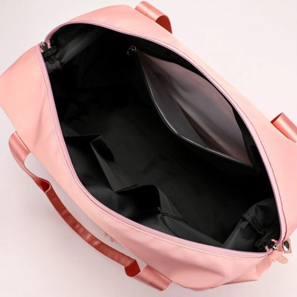 Rosa Catalina Deluxe framifrån, framhävande design och den diskreta logotypen.