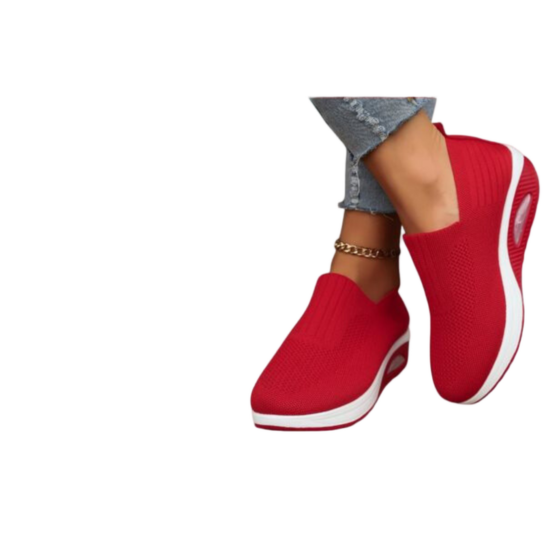 Interiör av svart damsneaker med fokus på den mjuka och ergonomiska innersulan, maximal komfort.