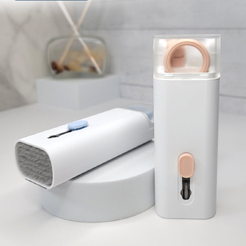 "Rosa och blå 7-i-1 rengöringssats för datorer och skärmar, innehåller borste och nyckelkapseldragare, kompakt design."