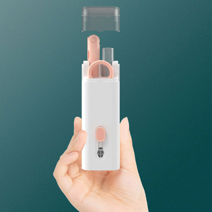 "Rosa och blå 7-i-1 rengöringssats för datorer och skärmar, innehåller borste och nyckelkapseldragare, kompakt design."