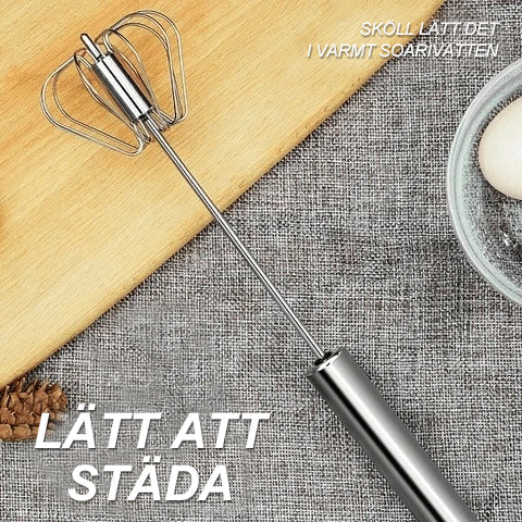 "Rostfri äggvispare med halvautomatisk funktion, elegant design, effektiv för matlagning, bakning och cocktailskapande."