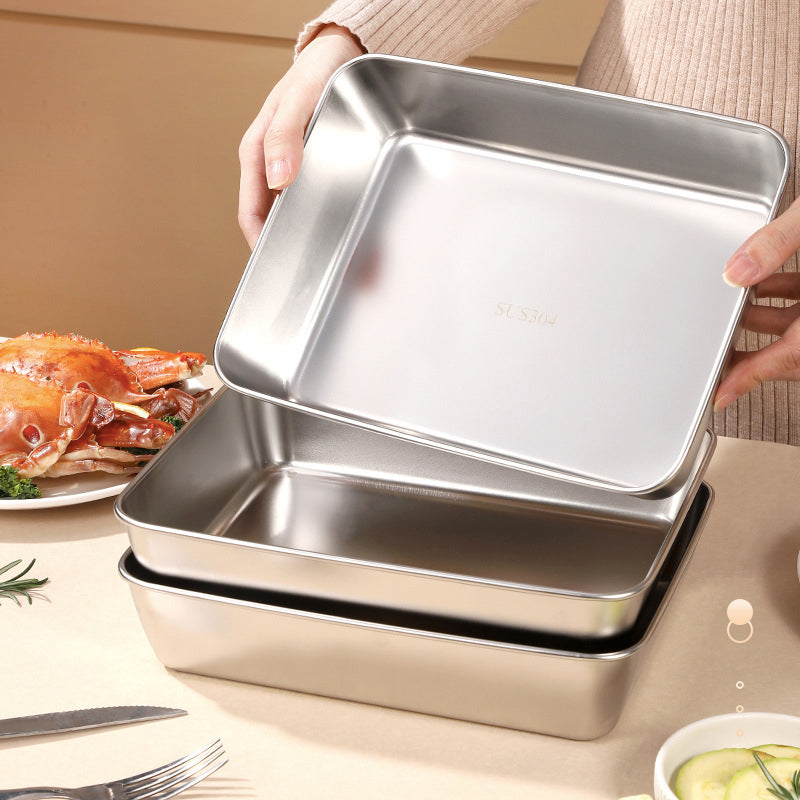 Rostfri fyrkantig bakform med lock, metallisk finish och släta kanter, perfekt för bakning och matlagning i köket.