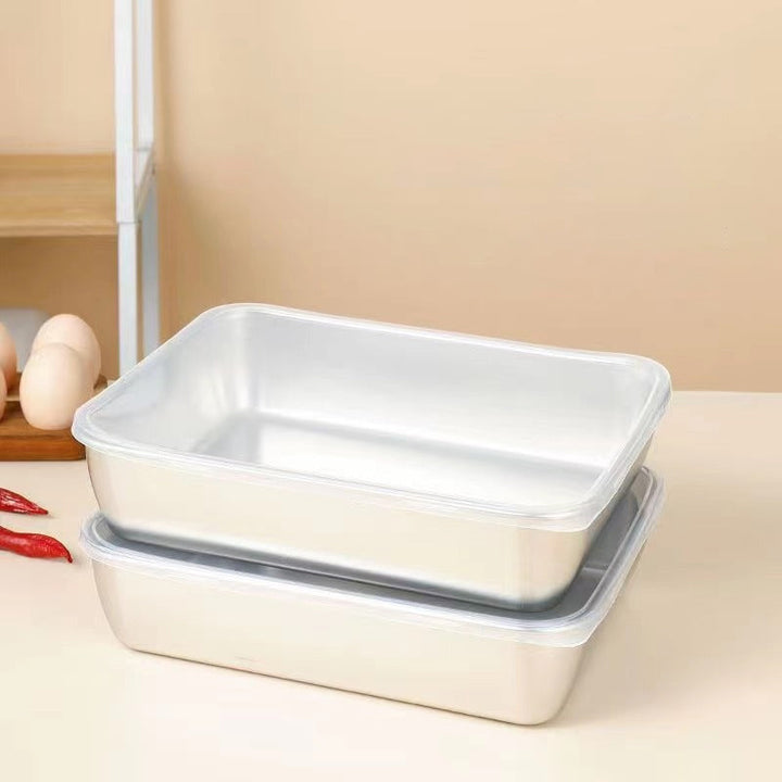 Rostfri fyrkantig bakform med lock, metallisk finish och släta kanter, perfekt för bakning och matlagning i köket.
