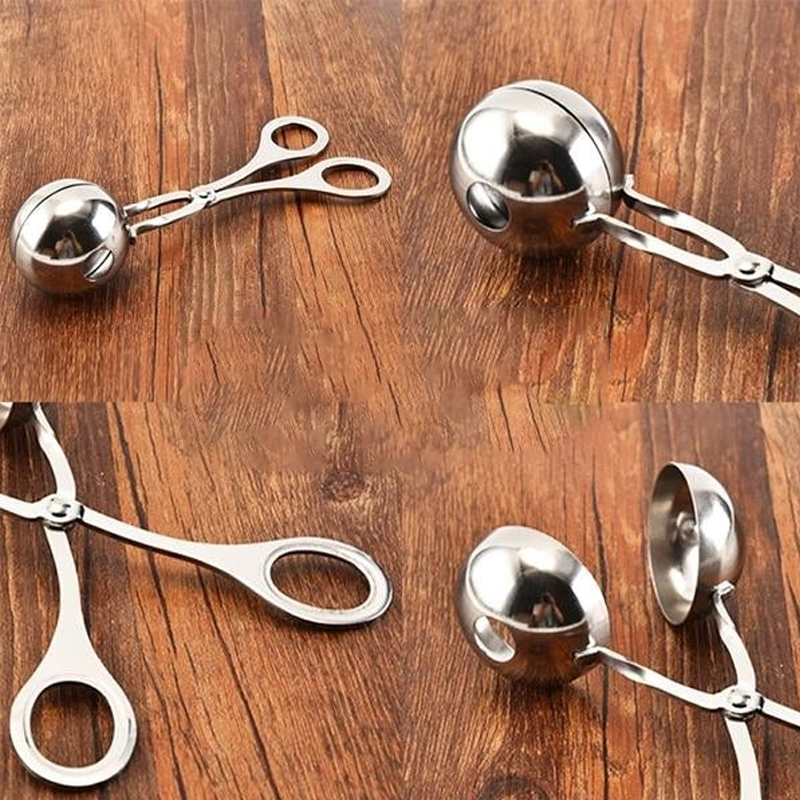 "Rostfri köttbulleskopa i silver, saxgrepp-design, idealisk för jämna köttbullar, meloner och kakbollar, i köksmiljö."