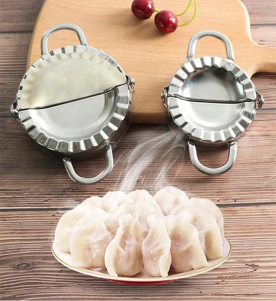 "Rostfritt stål dumplingmaskin och skalare med spegelpolerad yta för enkel och hygienisk användning i hemmakök."