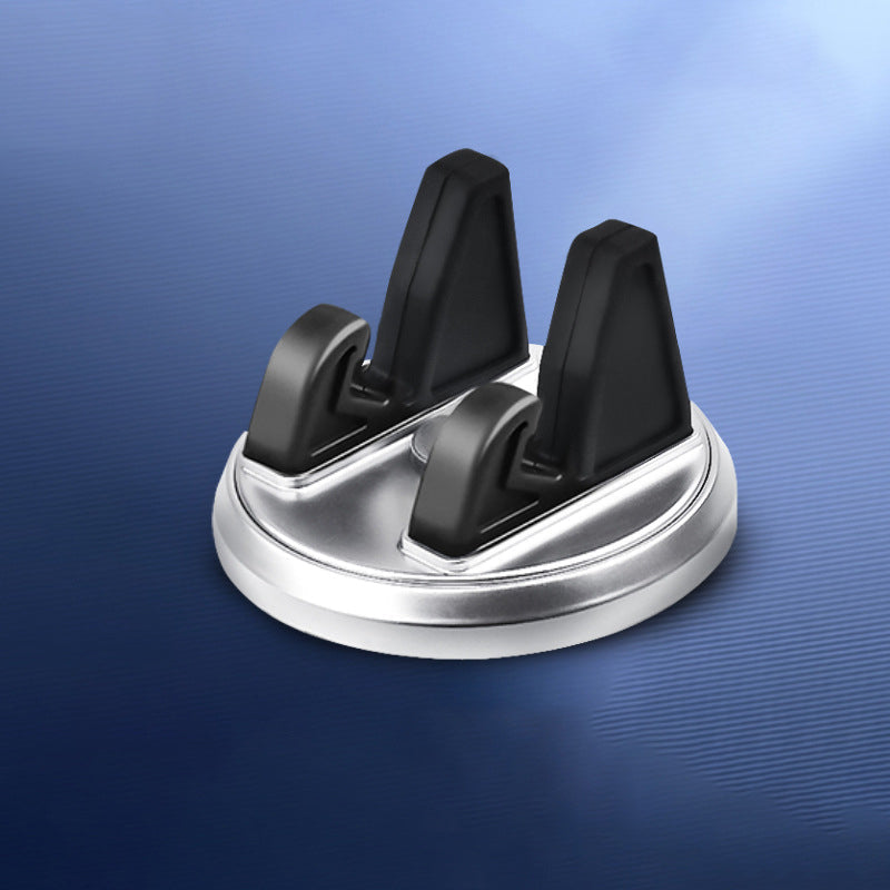 "Roterande bil mobilhållare med sugkopp, tillgänglig i svart eller silver, för säker telefonplacering under körning."