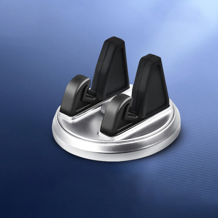 "Roterande bil mobilhållare med sugkopp, tillgänglig i svart eller silver, för säker telefonplacering under körning."