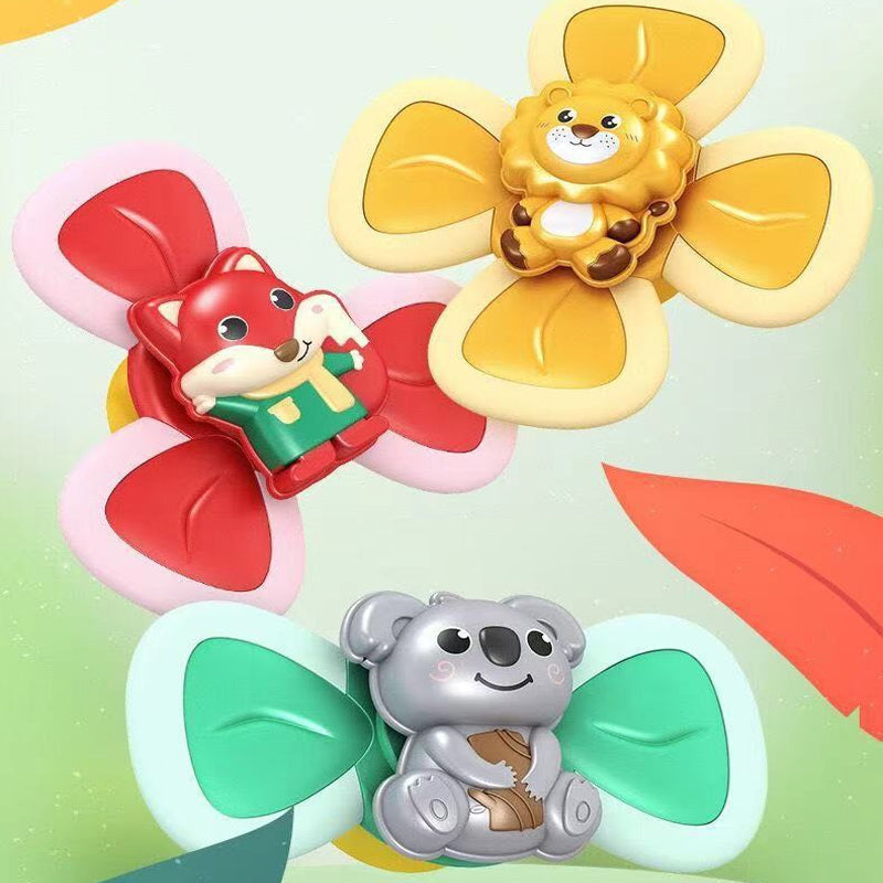 "Roterande insektsbadleksak för barn, färgglad och av ABS-plast, fästbar på släta ytor med sugkopp."