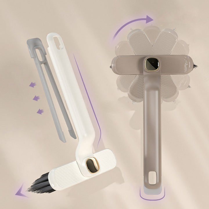 "Roterande multifunktionsborste i vit, grå och lila med ultrafina borsthår för effektiv rengöring av trånga utrymmen."