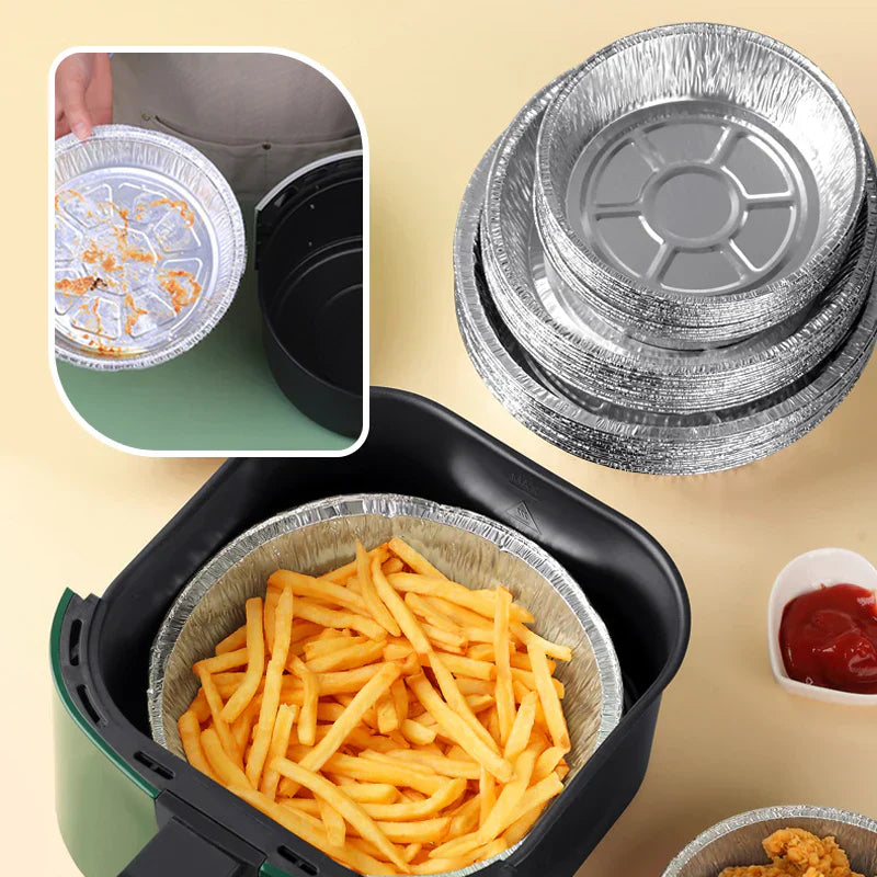 Rund foliebricka i aluminium, slittålig och skålformad, idealisk för mikrovågsugn och air fryer, förenklar matlagning.