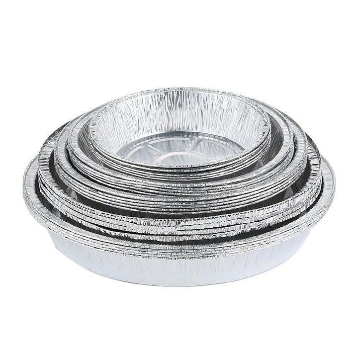 Rund foliebricka i aluminium, slittålig och skålformad, idealisk för mikrovågsugn och air fryer, förenklar matlagning.