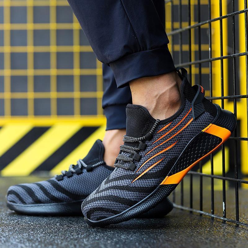 "Säkerhetsskor för män med ståltåhätta, mörk färg, halksäker sula, idealisk för arbetsmiljö, robust design."