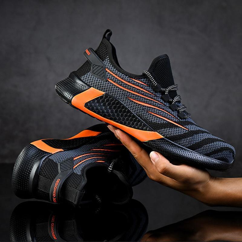 "Säkerhetsskor för män med ståltåhätta, mörk färg, halksäker sula, idealisk för arbetsmiljö, robust design."