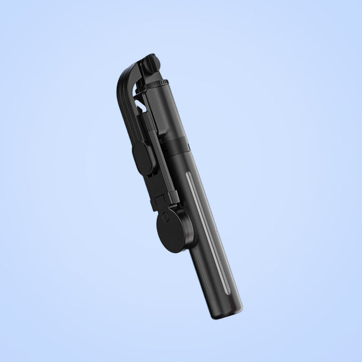 "Selfiepinne med dimbart LED-ljus och Bluetooth-fjärrkontroll, svart och vit, kompakt och bärbar, perfekt för nattbilder."