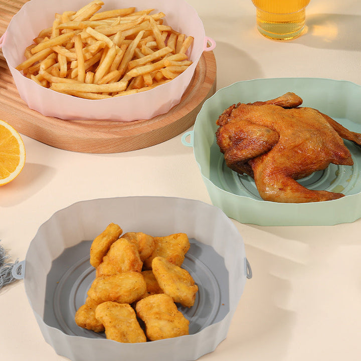 "Silikonbakbrickor för luftfritös i olika färger, perfekta för köket, hållbara och enkla att rengöra."
