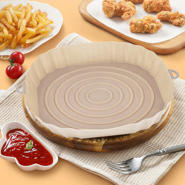 "Silikonbakbrickor för luftfritös i olika färger, perfekta för köket, hållbara och enkla att rengöra."