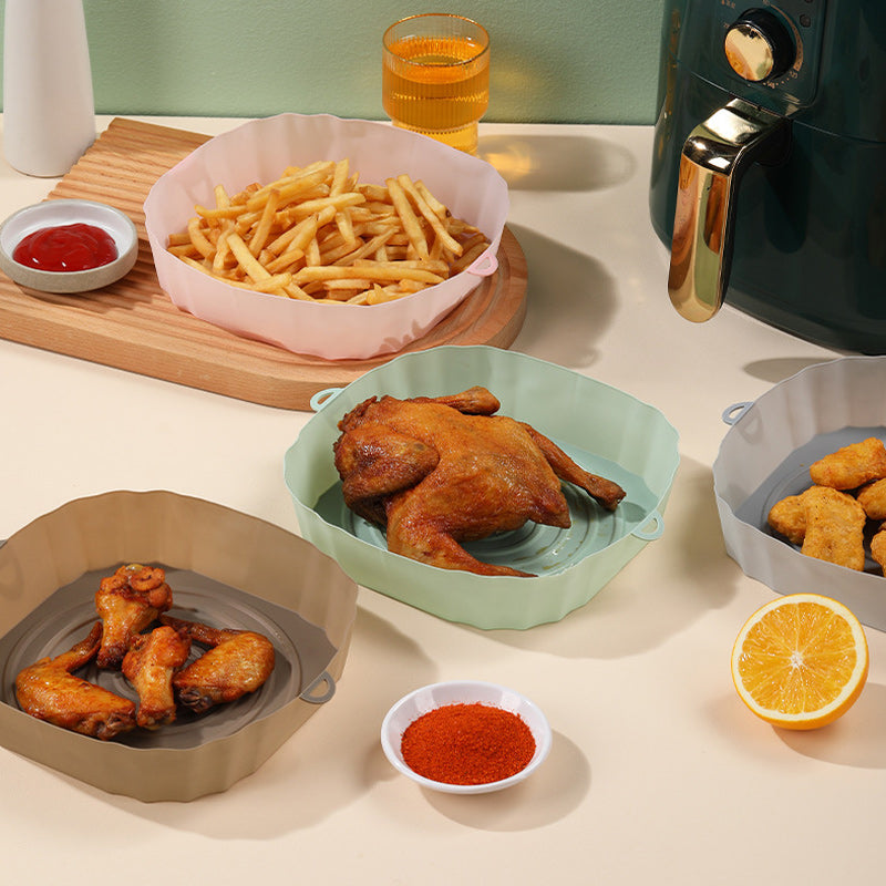 "Silikonbakbrickor för luftfritös i olika färger, perfekta för köket, hållbara och enkla att rengöra."