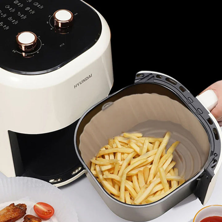"Silikonbakbrickor för luftfritös i olika färger, perfekta för köket, hållbara och enkla att rengöra."