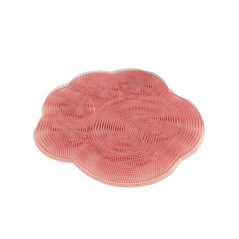 "Silikonmatta med sugkoppar och mjuka borstar för fotvård. Stabil och exfolierande, perfekt för spa-liknande hemupplevelse."