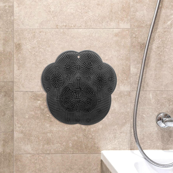 "Silikonmatta med sugkoppar och mjuka borstar för fotvård. Stabil och exfolierande, perfekt för spa-liknande hemupplevelse."