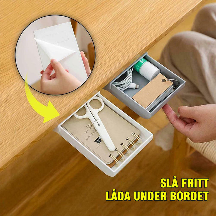 "Självhäftande dold skrivbordslåda i vit ABS-plast, kompakt design för ordning på skrivbordet, perfekt för kontorsförvaring."