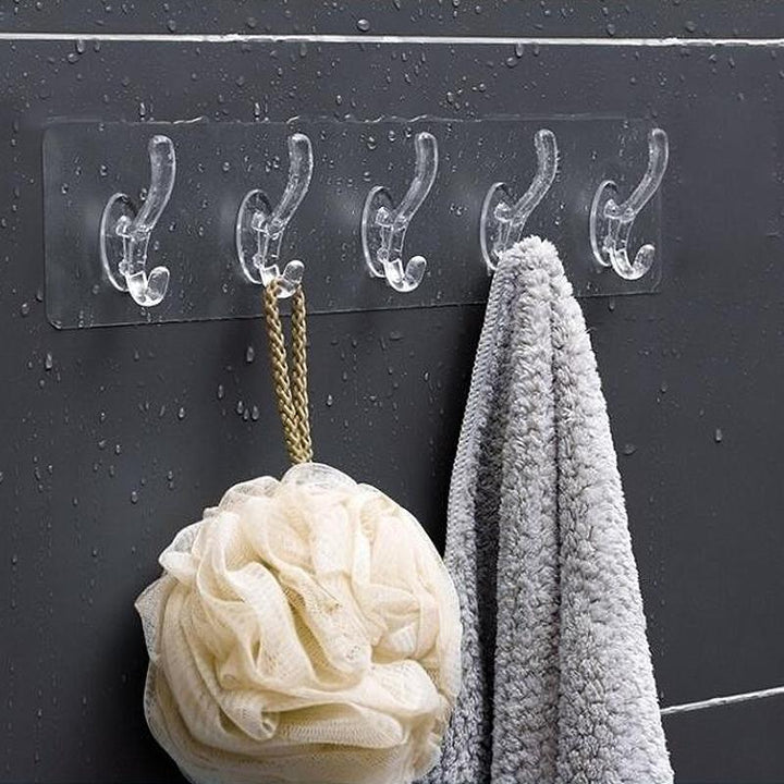 "Självhäftande genomskinliga väggkrokar, 5-pack, eleganta PVC-krokar för hem, slitstarka och mångsidiga användningar."