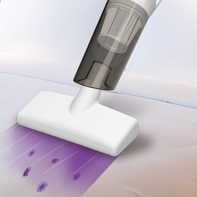 Sladdlös handdammsugare, vit/svart, för hem och bil, lätt och ergonomisk design för snabb städning av svåråtkomliga områden.