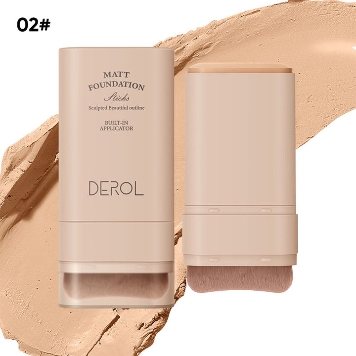 "Sminkstick med inbyggd borste, beige nyans, för enhetlig täckning och naturlig finish, kompakt och resvänlig."