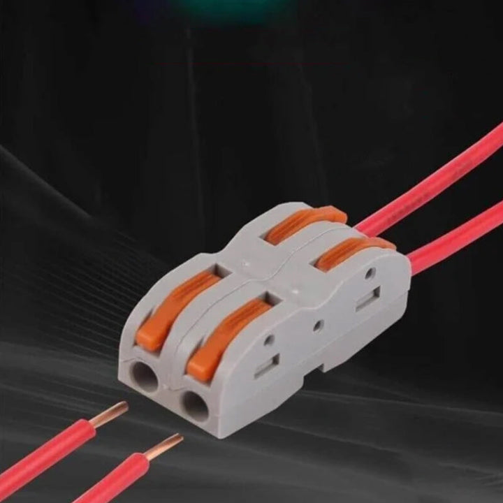 "Snabbkopplingsterminal med flamskydd, verktygslös och kompakt design i grå och transparenta nyanser, 3,9x0,8x1,8 cm."