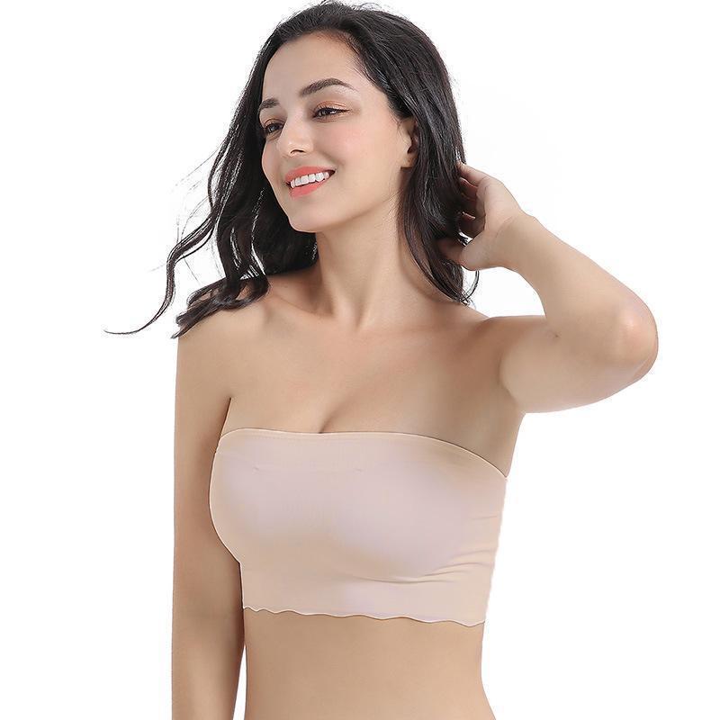 "Sömlös bandeau topp i mjuk nylon, vit färg, vår/somrig look, sömlös design, inga byglar, bekväm och stilren."
