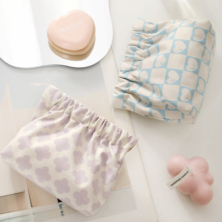 "Söt mini portabel myntväska i canvas med charmiga mönster och färger, perfekt accessoar för kvinnor, 12x5x13 cm."