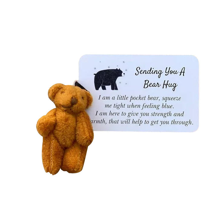 "Söt plysch björn nyckelring i ljusbrun färg, liten och mjuk, perfekt accessoar för väskor och nycklar."