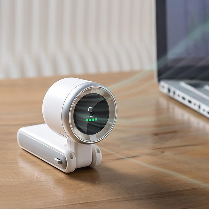 "Stilfull hopfällbar handhållen turbinfläkt, kompakt för resor och hem. 180° justerbar med 3-i-1 funktion."