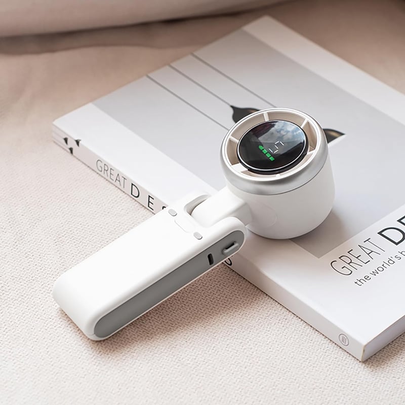 "Stilfull hopfällbar handhållen turbinfläkt, kompakt för resor och hem. 180° justerbar med 3-i-1 funktion."