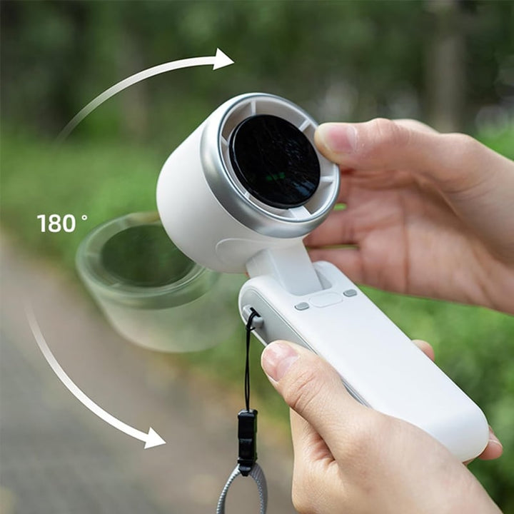 "Stilfull hopfällbar handhållen turbinfläkt, kompakt för resor och hem. 180° justerbar med 3-i-1 funktion."