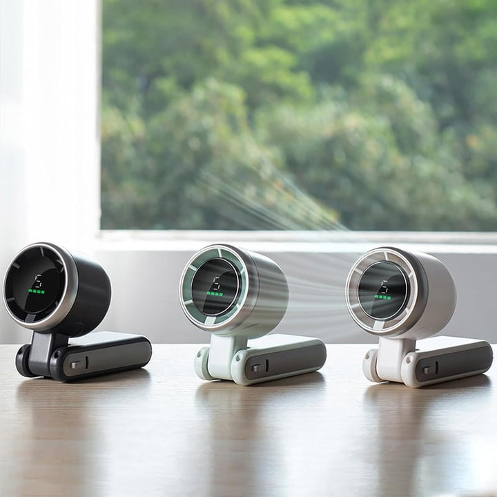 "Stilfull hopfällbar handhållen turbinfläkt, kompakt för resor och hem. 180° justerbar med 3-i-1 funktion."