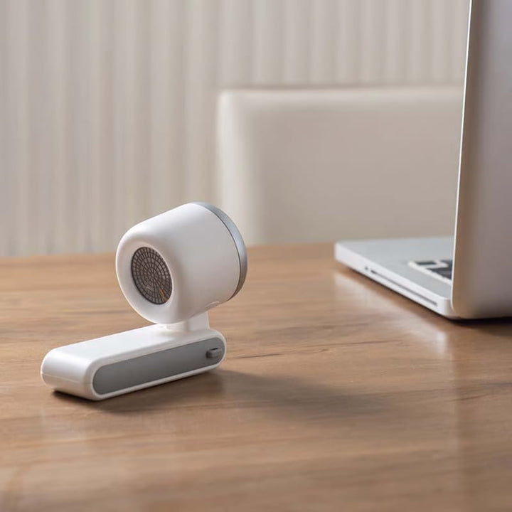 "Stilfull hopfällbar handhållen turbinfläkt, kompakt för resor och hem. 180° justerbar med 3-i-1 funktion."