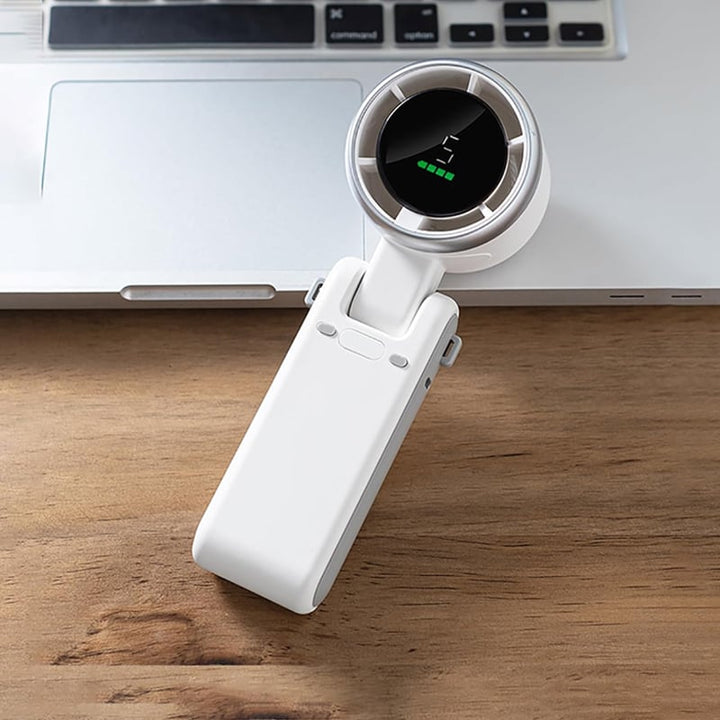 "Stilfull hopfällbar handhållen turbinfläkt, kompakt för resor och hem. 180° justerbar med 3-i-1 funktion."