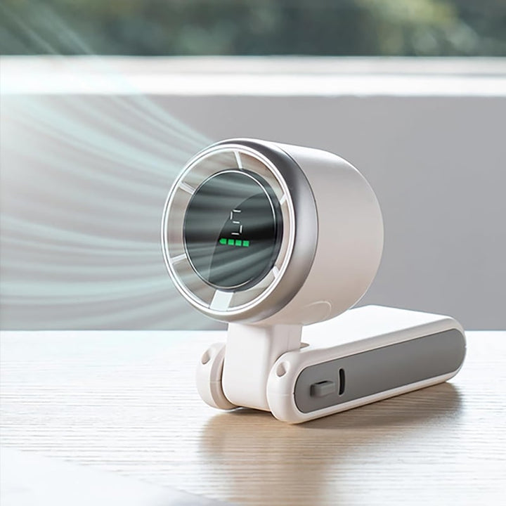 "Stilfull hopfällbar handhållen turbinfläkt, kompakt för resor och hem. 180° justerbar med 3-i-1 funktion."