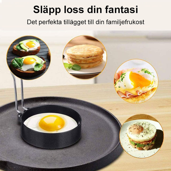 "Stilren non-stick omeletring i rostfritt stål med vikbart handtag, perfekt för ägg och pannkakor i köket."