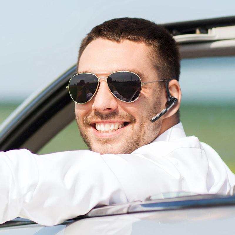 "Stilrent trådlöst Bluetooth-headset för affärsmän, elegant design, svart med öronproppar och justerbar mikrofon."