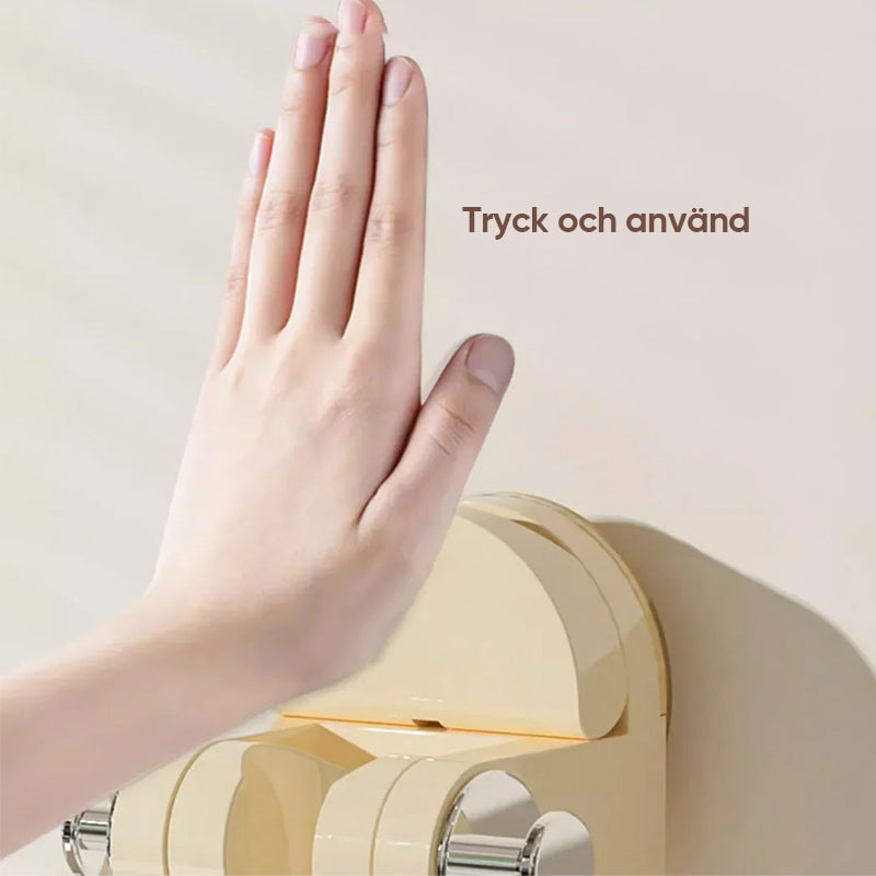 "Sugkopp duschtillbehör i silver och transparent ABS-material, justerbar krok för duschmunstycke, stilren badrumsdesign."