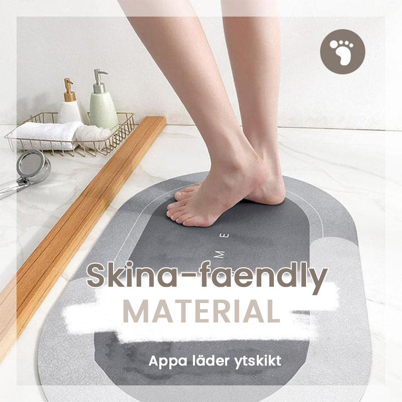"Superabsorberande halkfri badrumsmatta i mjuk, snabbabsorberande material med moderna färger, idealisk för våta golv."