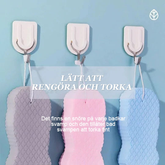 "Supermjuk exfolierande badsvamp i pastellfärger; skonsam rengöring för känslig hud, idealisk för barn och vuxna."
