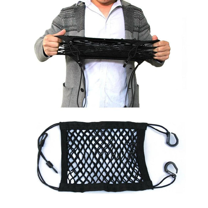 "Svart förvaringsnät för bilsäte med flexibel fyrsidig mesh. Slitstarkt nylon, organiserar resor, 25x30 cm."