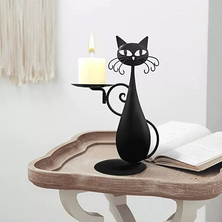"Svart katt-design ljusstake i metall, handgjord med elegant svart yta, perfekt för heminredning och unik dekoration."